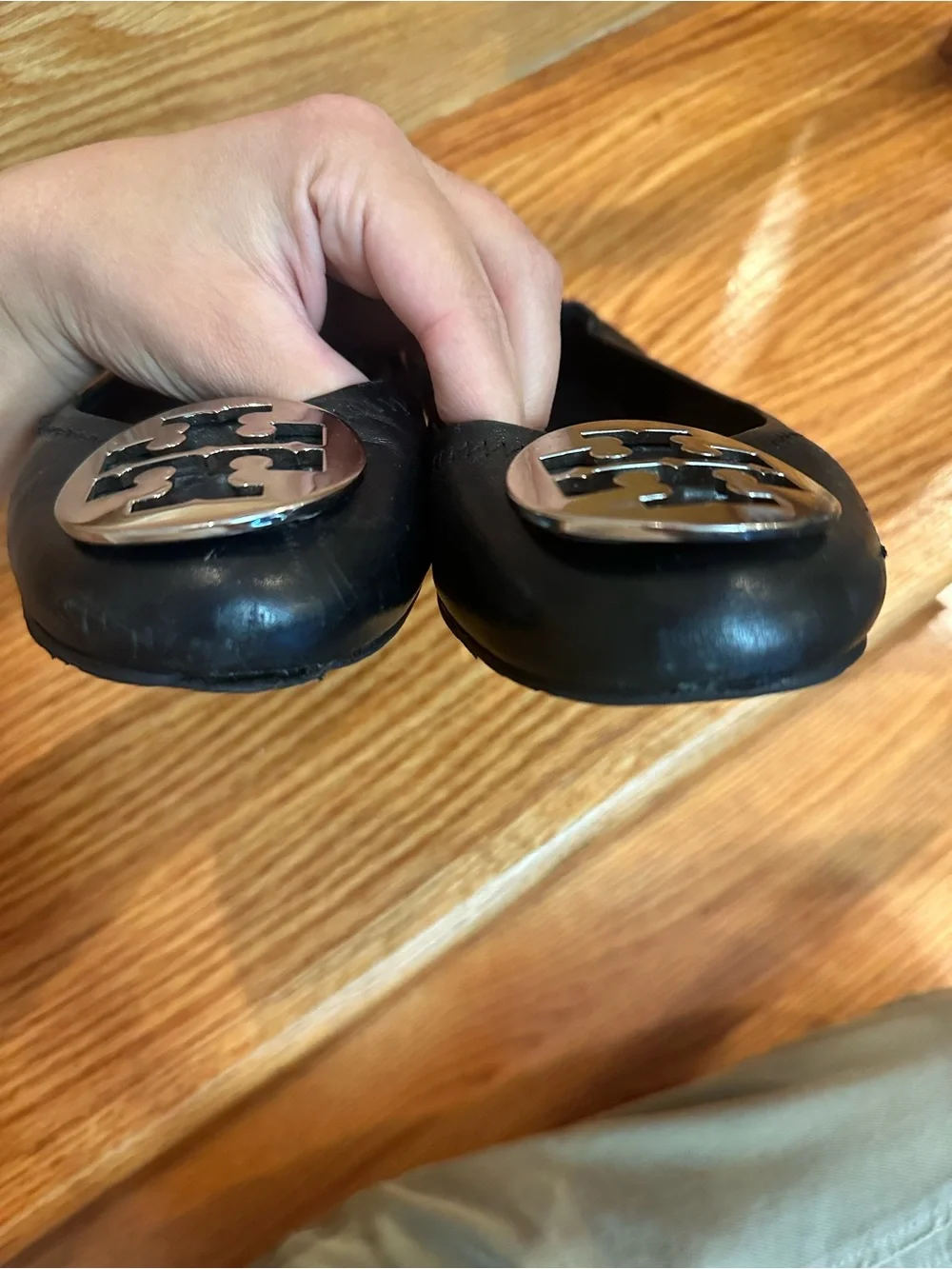 Tory Burch Black Leather Logo Ballet Flats with Silver Emblem